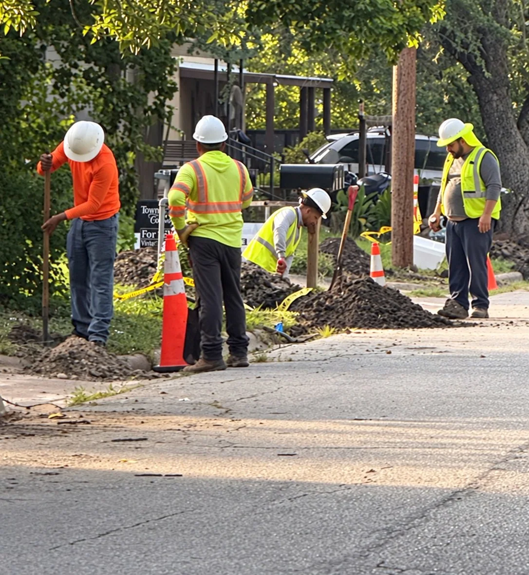 Crew working on underground utility installation