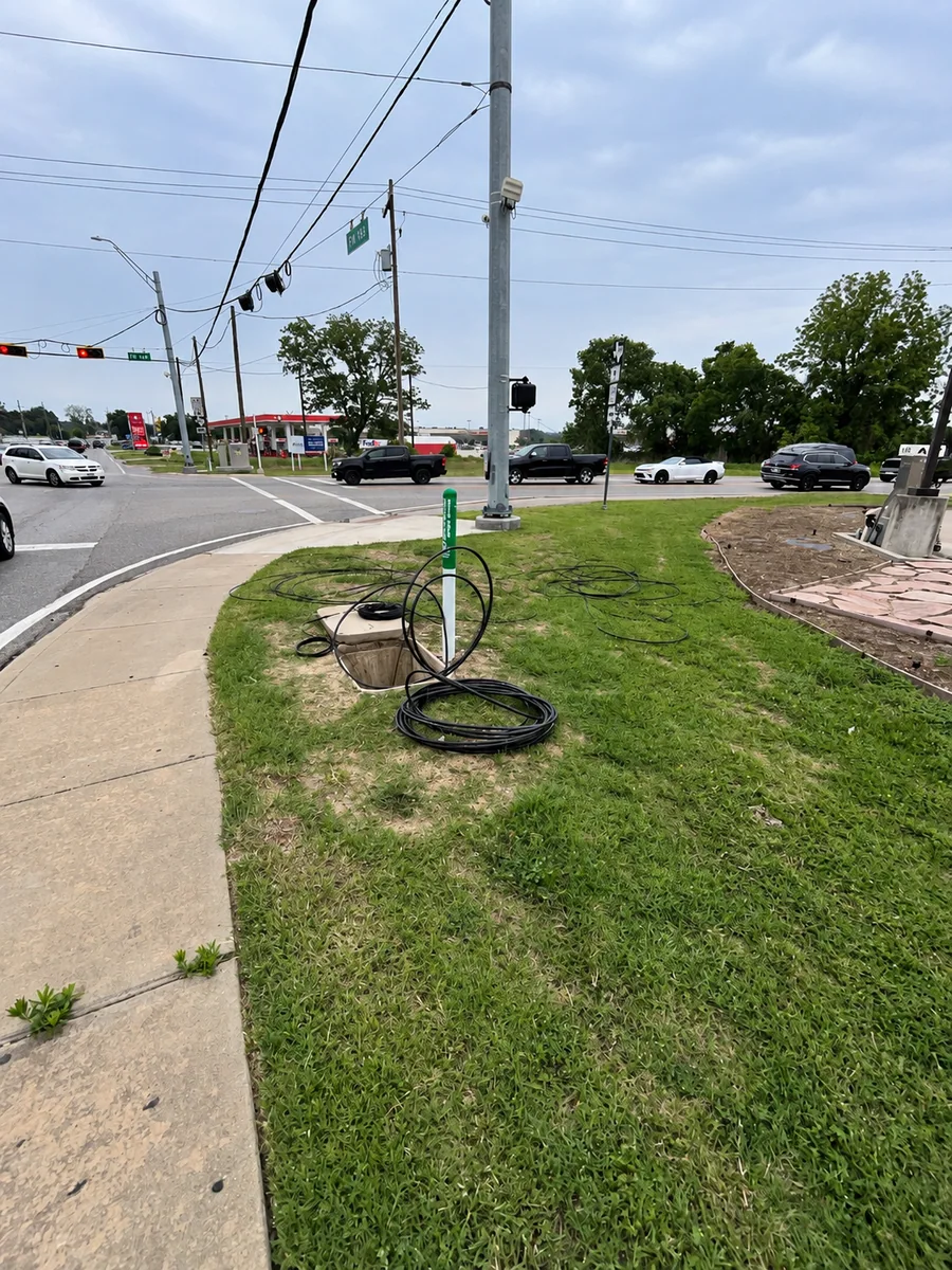 Underground communications pathway work at a street intersection