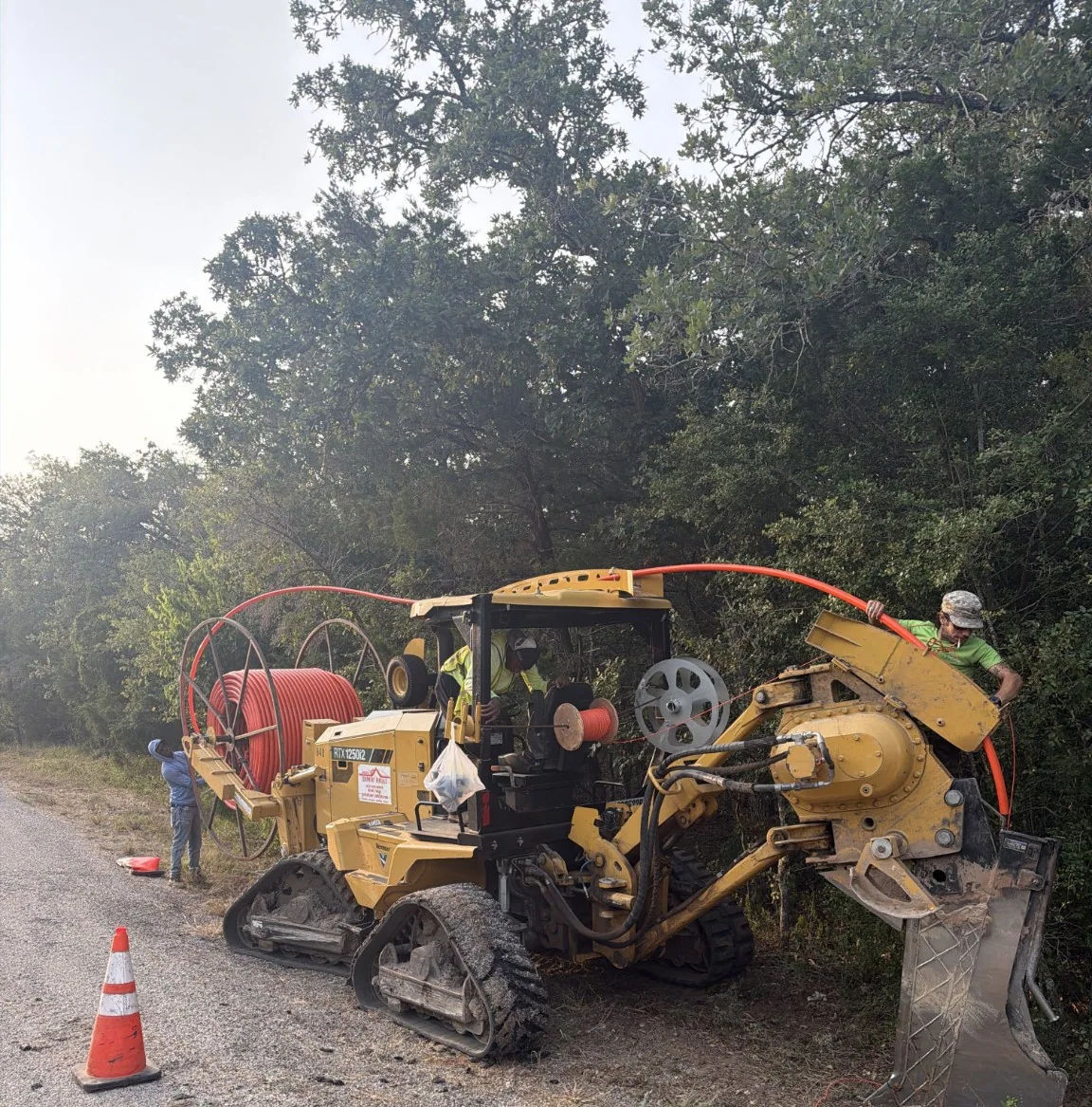 Tracked utility plow used for underground conduit installation