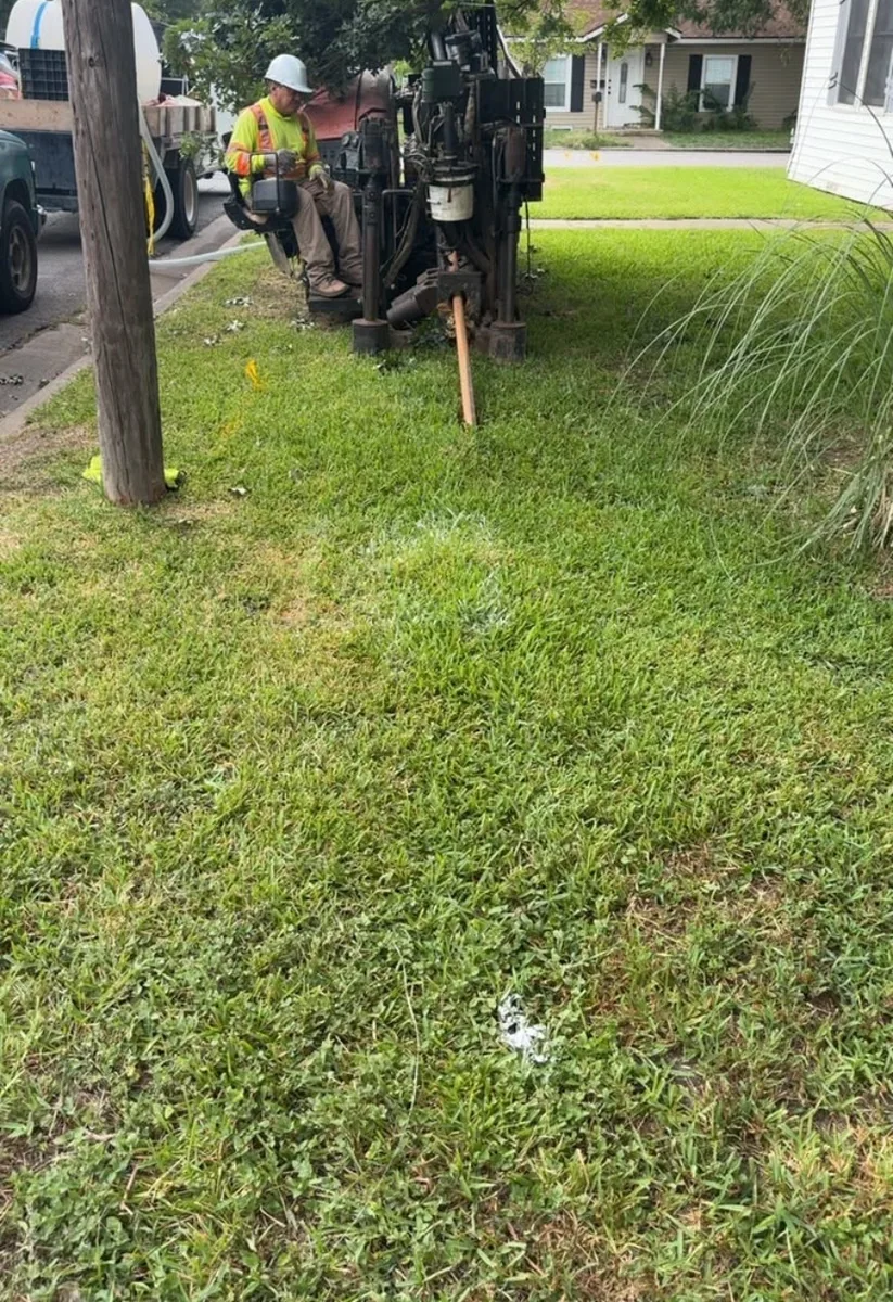 Operator performing directional drilling beside a residential street