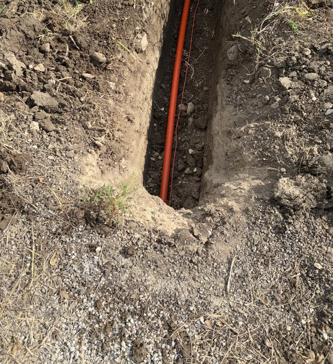 Prepared trench crossing for underground conduit